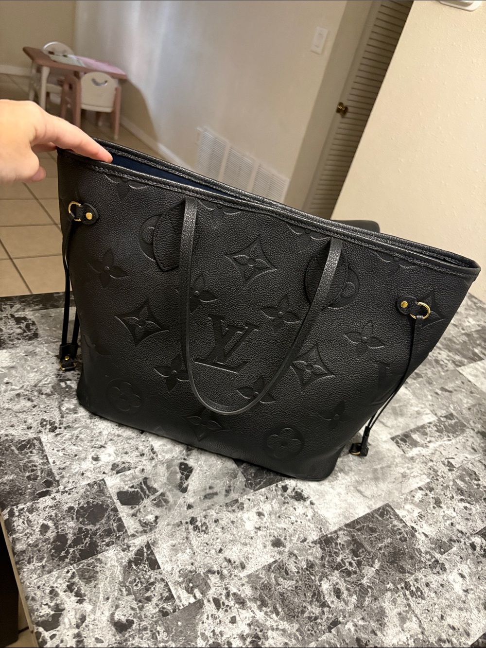 Louis Vuitton neverfull black empreinte leather